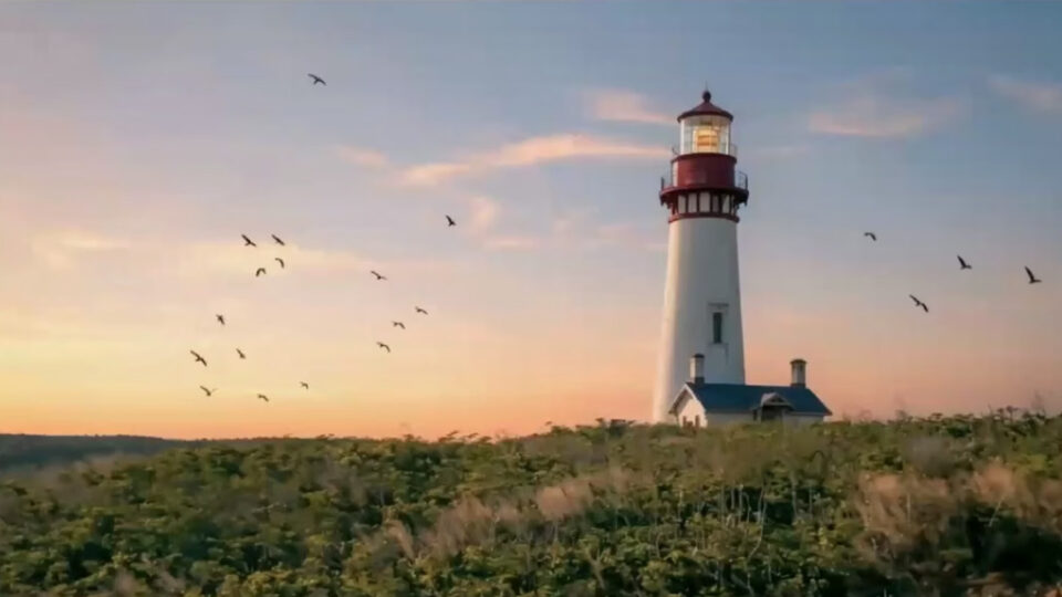 Lighthouse at sunset with birds in flight edited in ON1 Photo RAW MAX 2026.4 using Restore AI to recover detail, enhance color, and bring photos back to life